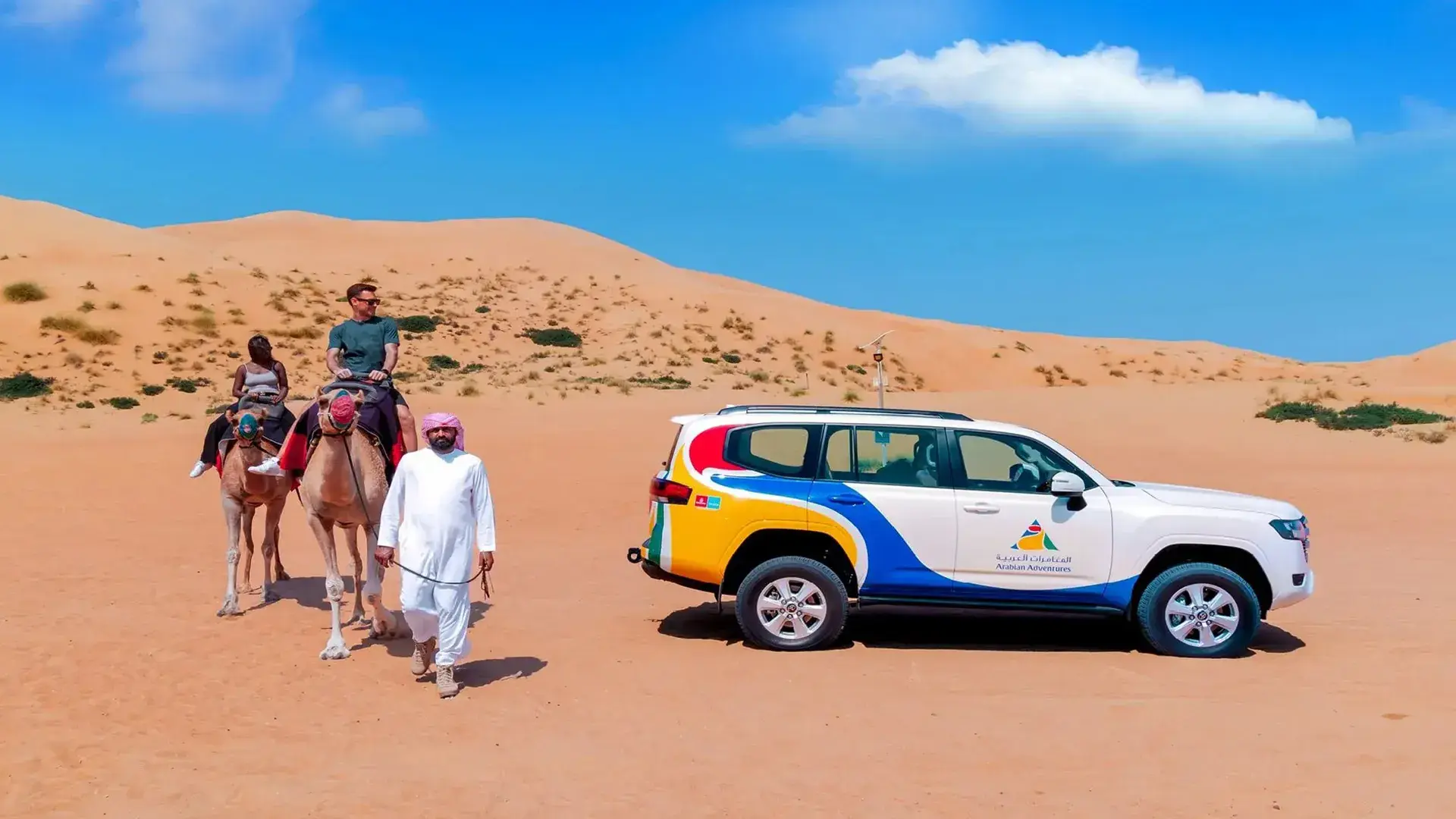 Morning Desert Safari Dubai - A 4x4 Land Cruiser and camel ride experience in the golden desert dunes.