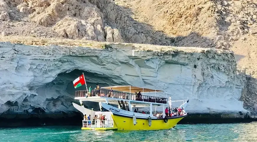Musandam Dibba Trip from Dubai: Adventurous boat tour through the crystal-clear waters of Musandam.