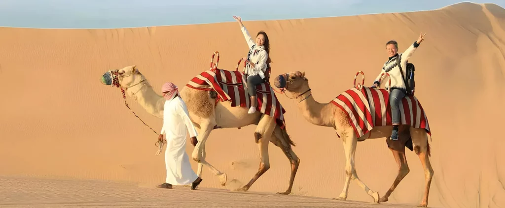 Camel Rides and Sandboarding