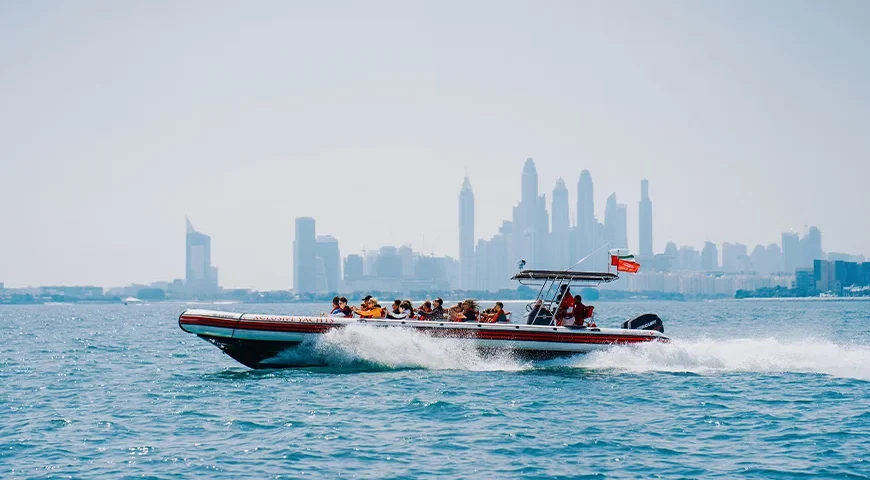 Family Enjoying Speed Boat Tour in Dubai – Go Kite Travel Adventure Packages